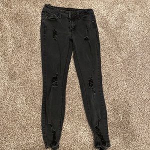 skinny ripped black jeans.